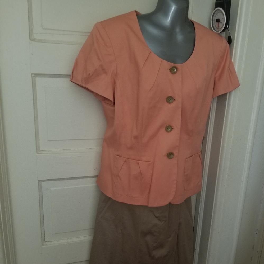 Beautiful  skirt suit 4 button up top.